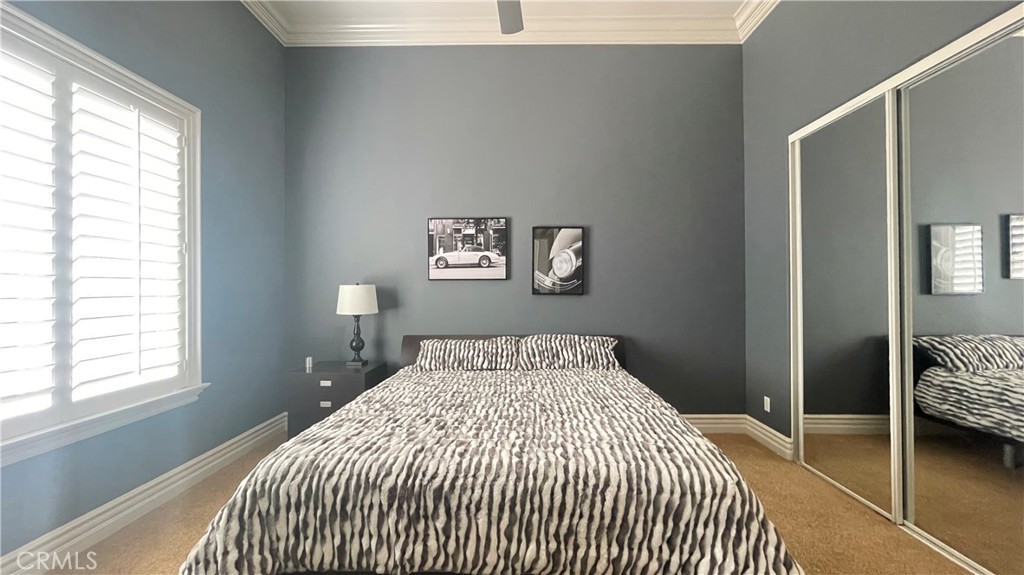 4069 Nancy Circle Corona, CA 92881 - Photo 59 of 73 a bedroom with a bed and a window