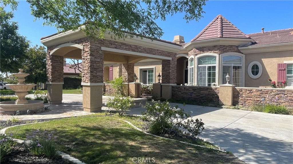 4069 Nancy Circle Corona, CA 92881 - Photo 6 of 73 a front view of a house with a yard