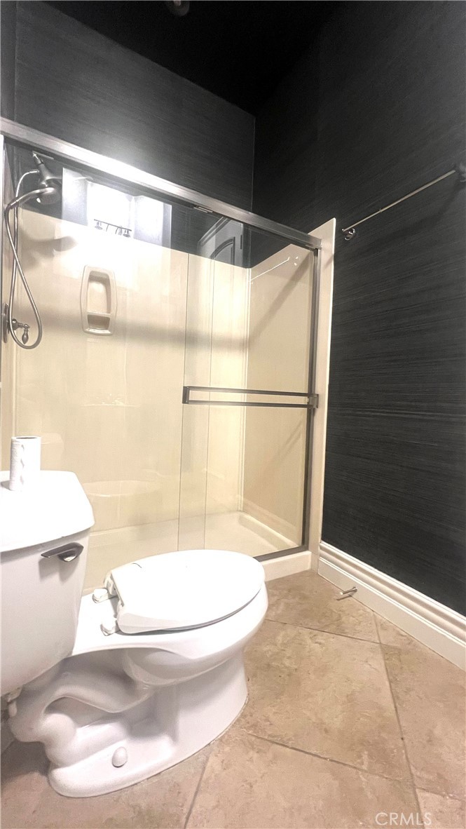 4069 Nancy Circle Corona, CA 92881 - Photo 61 of 73 a bathroom with a bathtub and a shower