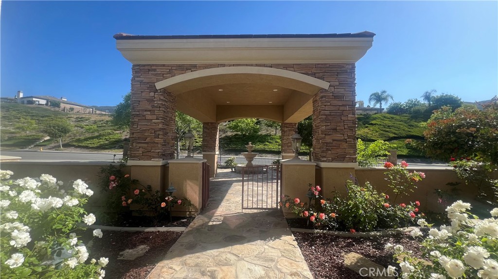 4069 Nancy Circle Corona, CA 92881 - Photo 73 of 73 a front view of a house with a garden