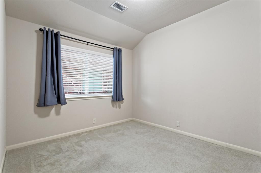 816 Harrison Lane Lavon, TX 75166 - Photo 22 of 40 an empty room with a window
