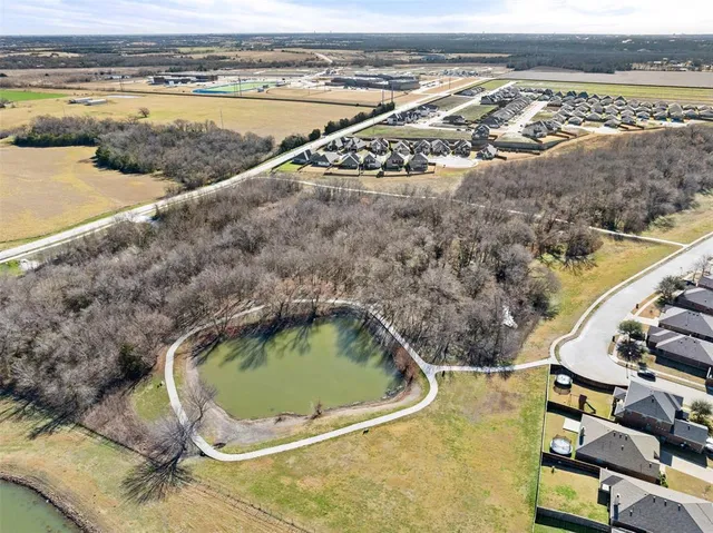 a view of a swimming pool and an outdoor space