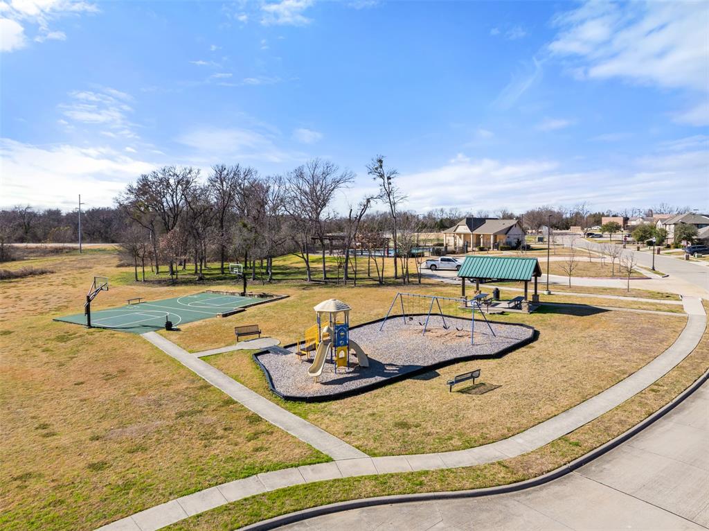 816 Harrison Lane Lavon, TX 75166 - Photo 39 of 40 swimming pool view with a seating space