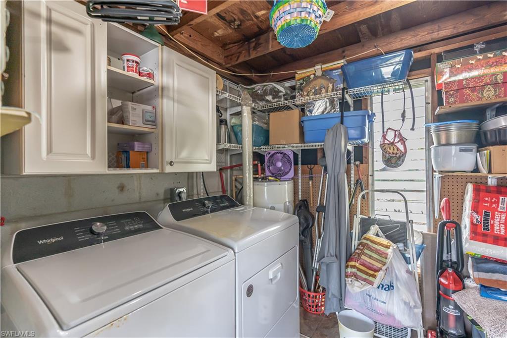 1360 5th Avenue North Naples, FL 34102 - Photo 20 of 45 a utility room with dryer and washer