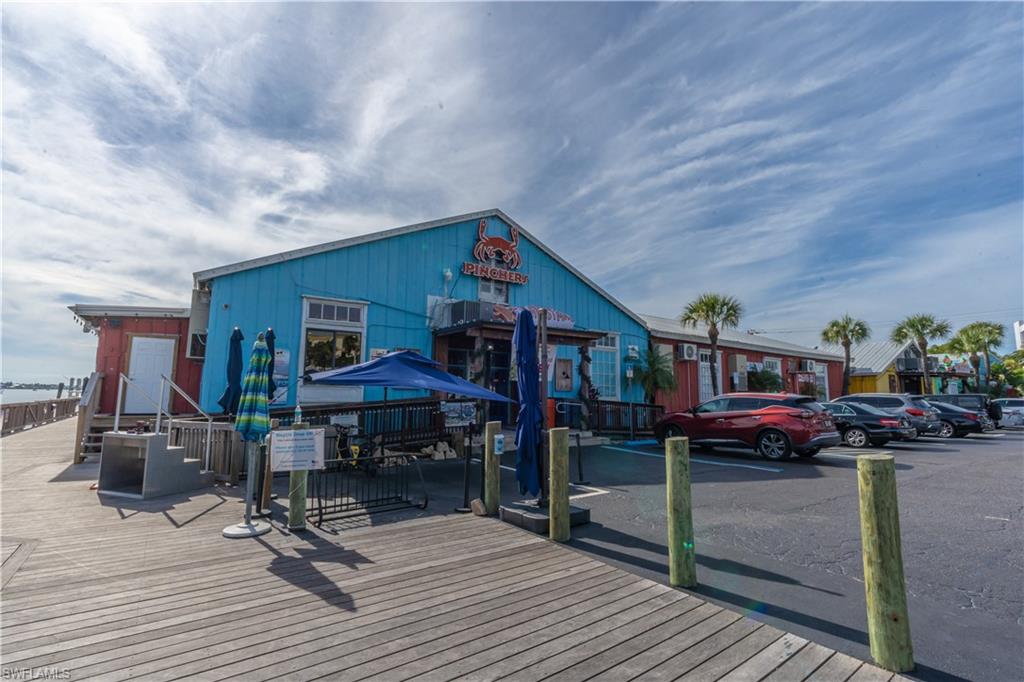 1360 5th Avenue North Naples, FL 34102 - Photo 37 of 45 a outdoor space with furniture