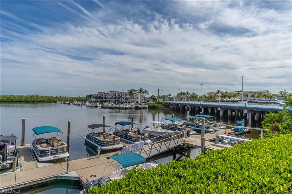 1360 5th Avenue North Naples, FL 34102 - Photo 39 of 45 a view of a lake with outdoor seating space