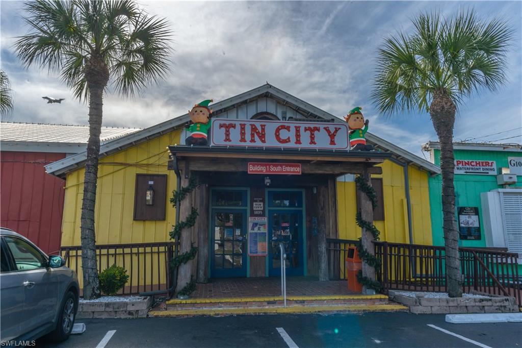 1360 5th Avenue North Naples, FL 34102 - Photo 44 of 45 a view of a entryway door of the building