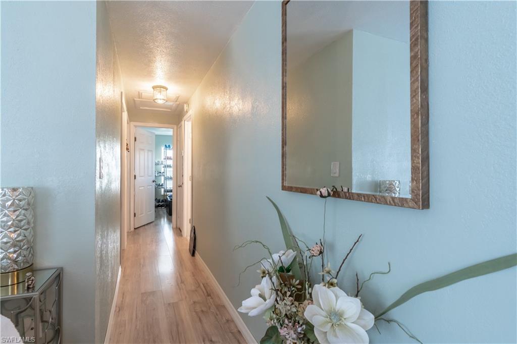 1360 5th Avenue North Naples, FL 34102 - Photo 9 of 45 a view of a room with wooden floor