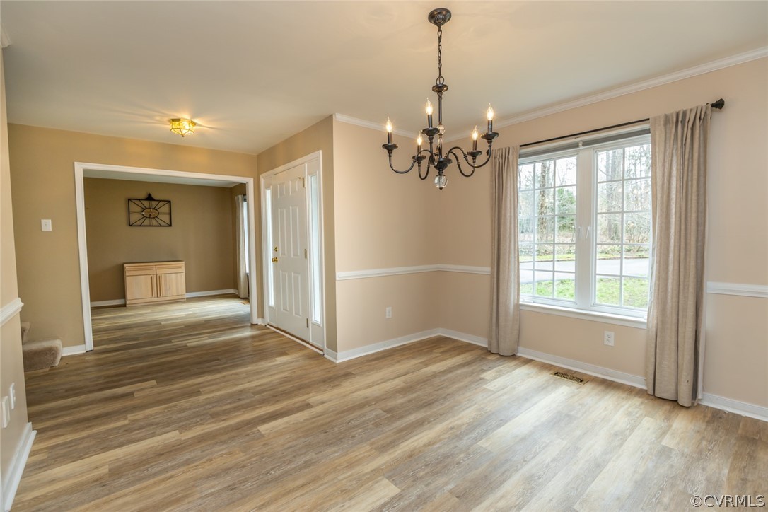 14009 Harbour Pointe Road Midlothian, VA 23112 - Photo 12 of 50 Dining room with laminate flooring, pendant lighti