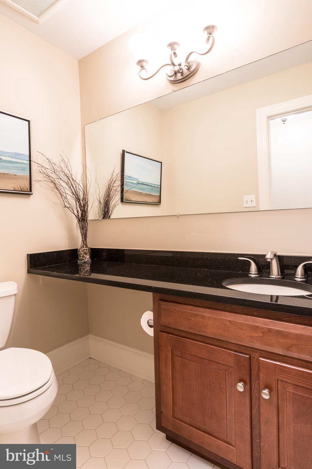 6040 Chapman Road Lorton, VA 22079 - Photo 18 of 58 Half bath with granite counter-top