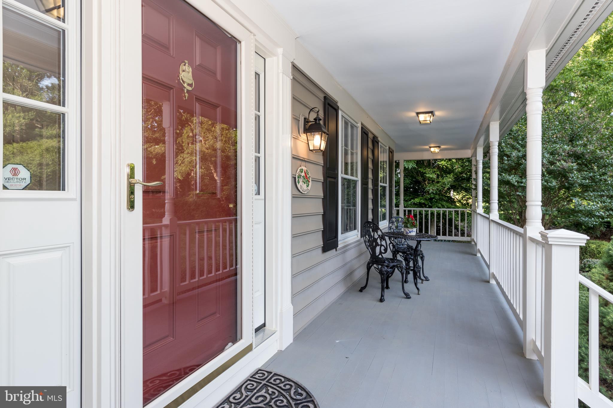6040 Chapman Road Lorton, VA 22079 - Photo 52 of 58 Large wrap-around porch and convenient storm door