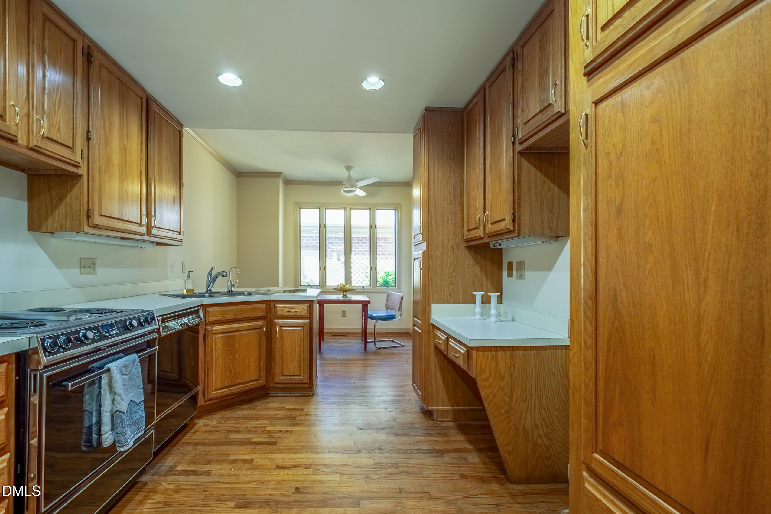 10 Innisfree Drive Durham, NC 27707 - Photo 15 of 36 a kitchen with stainless steel appliances granite countertop wooden cabinets a sink and dishwasher