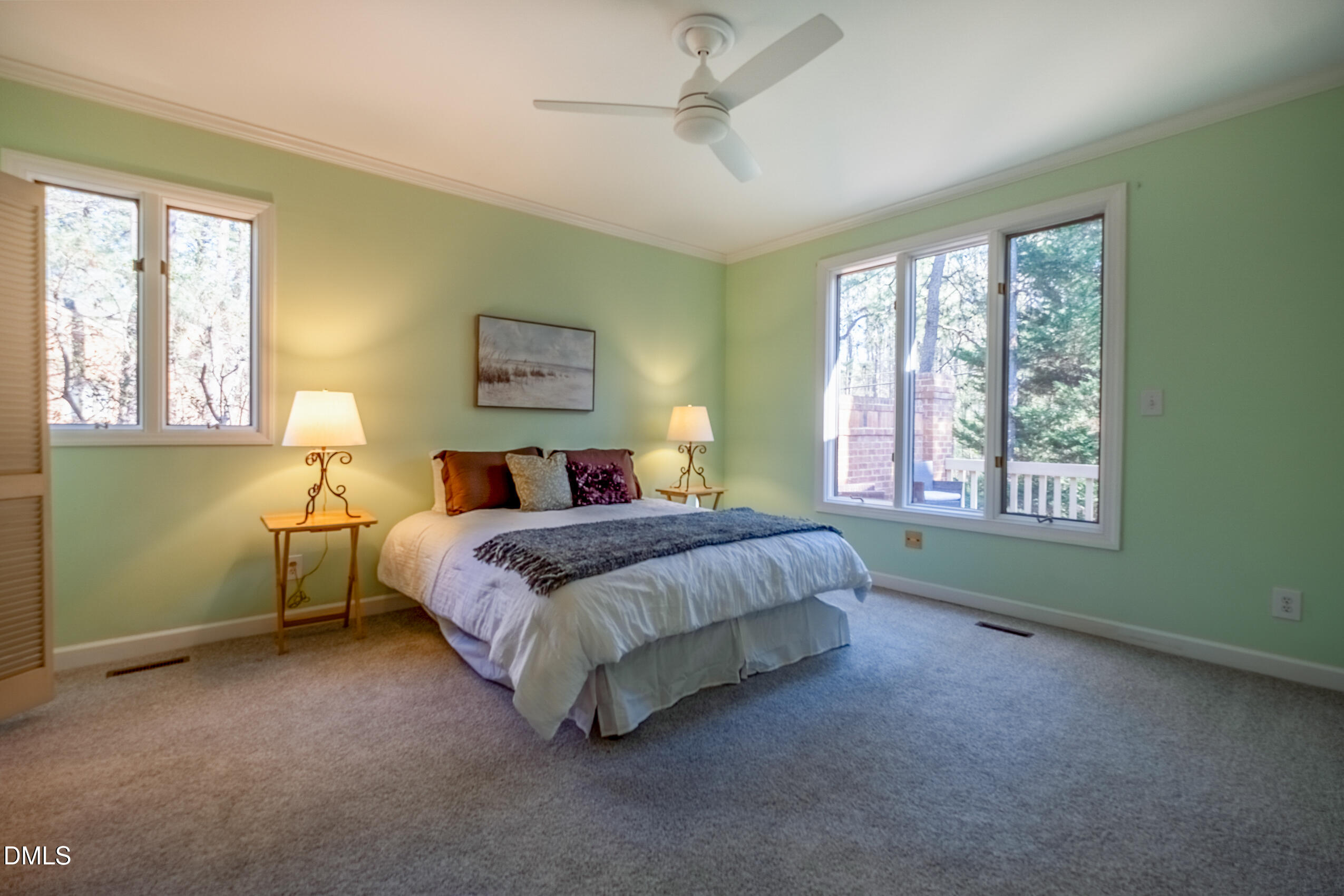 10 Innisfree Drive Durham, NC 27707 - Photo 22 of 36 a bedroom with a bed and a window