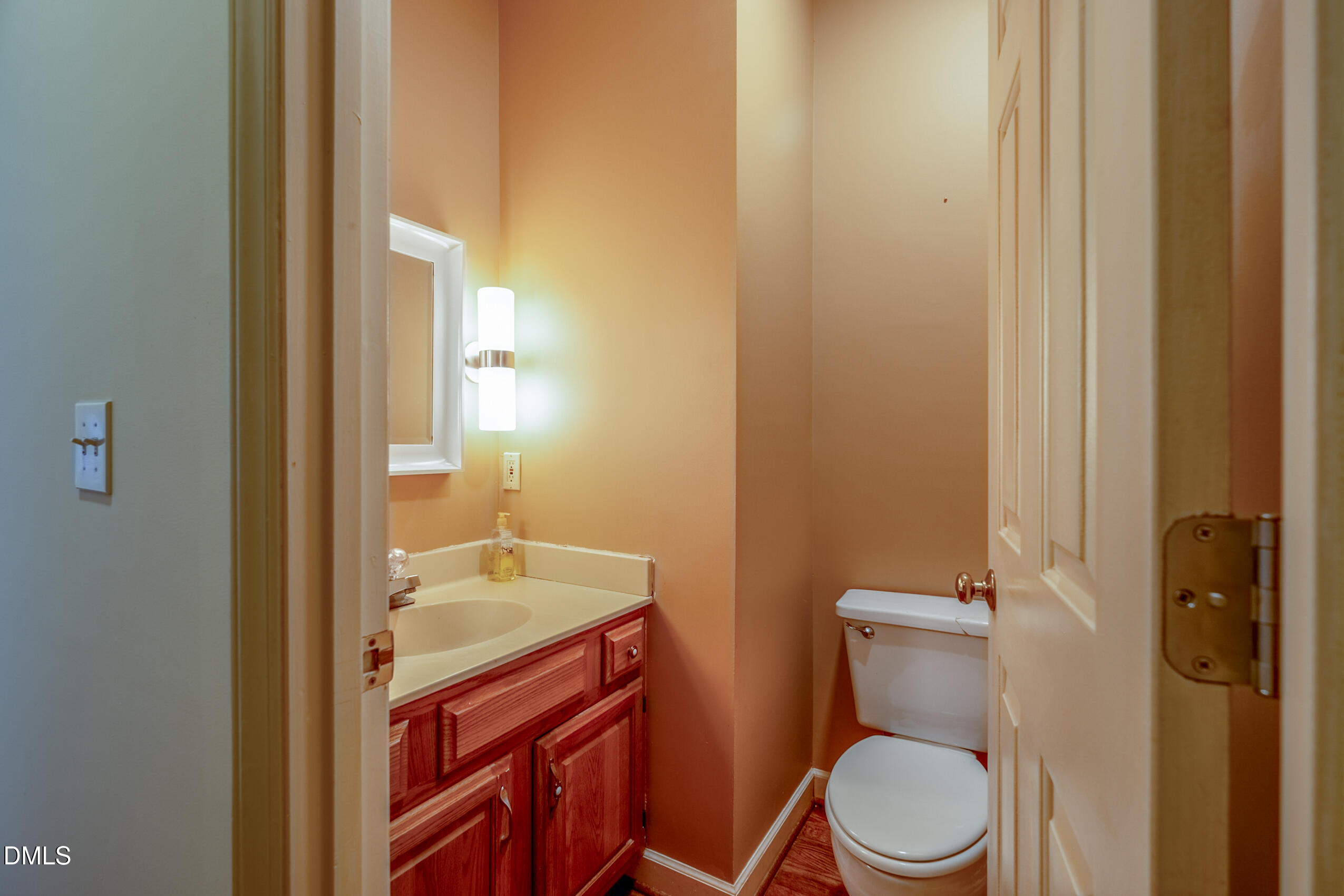 10 Innisfree Drive Durham, NC 27707 - Photo 23 of 36 a bathroom with a sink a toilet and shower