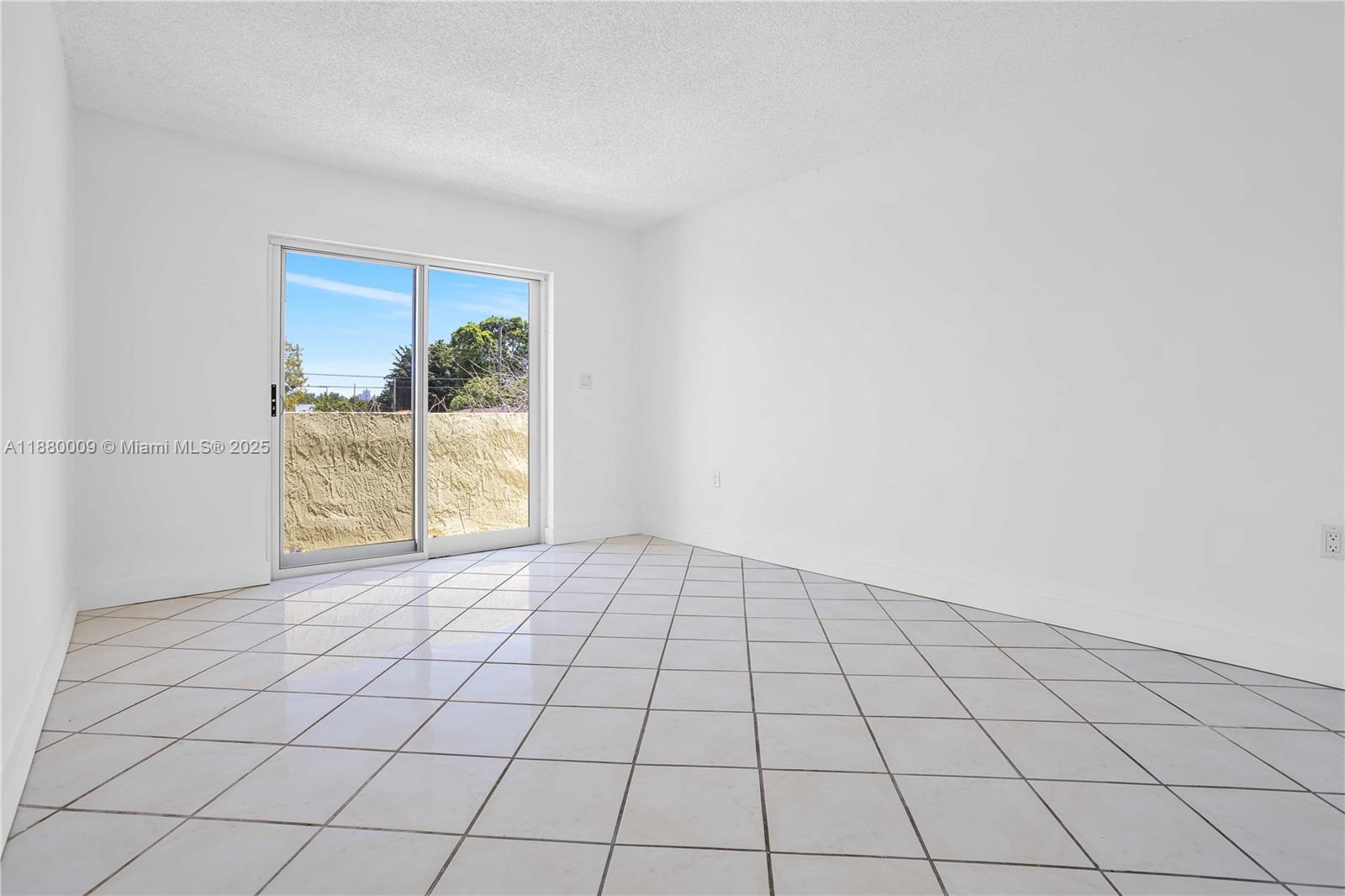 3524 Northwest 4th Terrace, Unit 1 Miami, FL 33125 - Photo 24 of 35 a view of an empty room and window