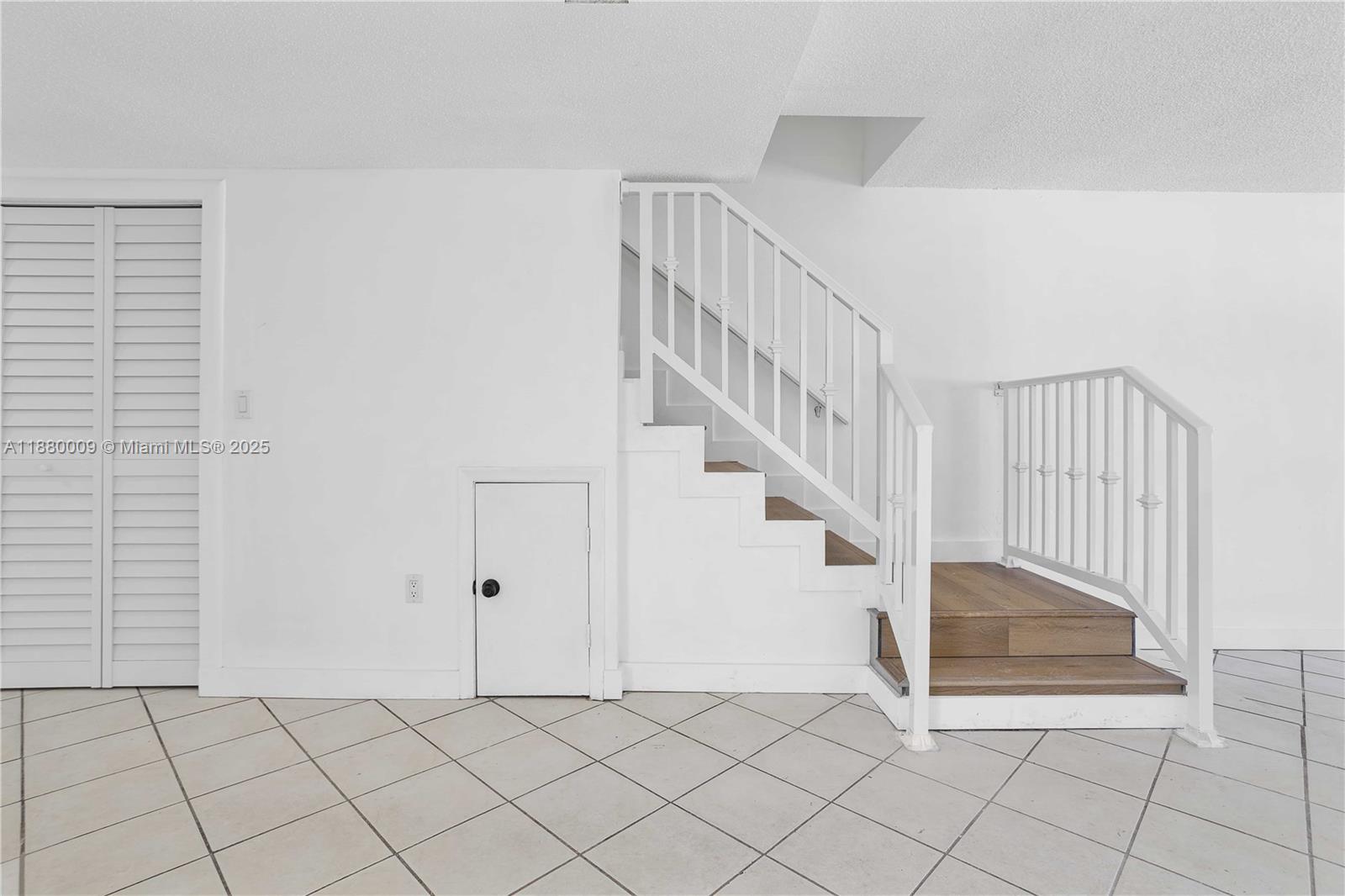 3524 Northwest 4th Terrace, Unit 1 Miami, FL 33125 - Photo 10 of 35 a view of entryway and hall with a window