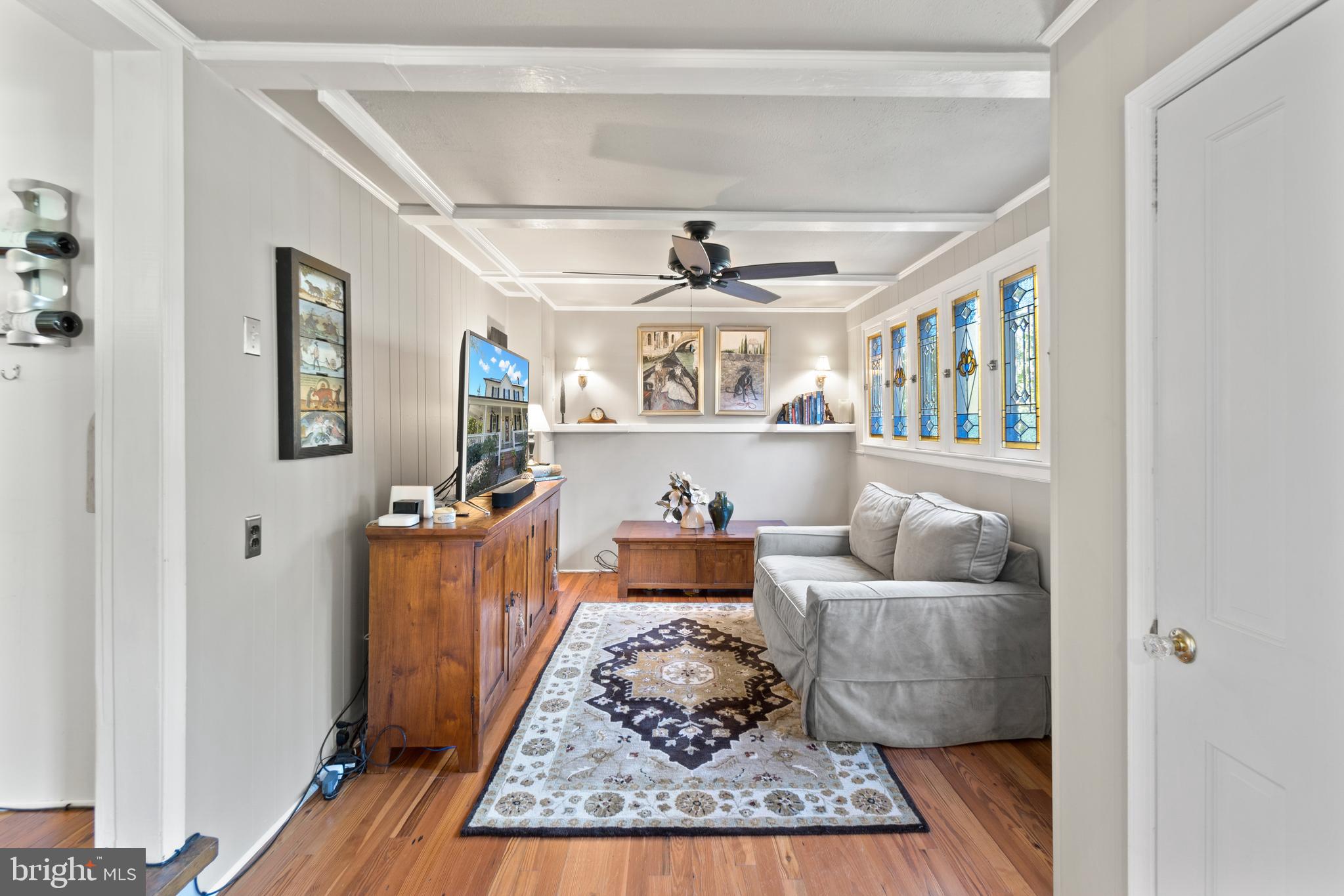 1005 Grant Street Herndon, VA 20170 - Photo 12 of 59 a living room with furniture and a wooden floor