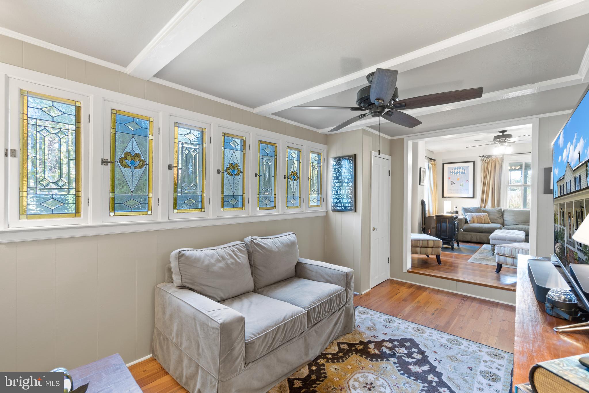 1005 Grant Street Herndon, VA 20170 - Photo 13 of 59 a living room with furniture and a large window