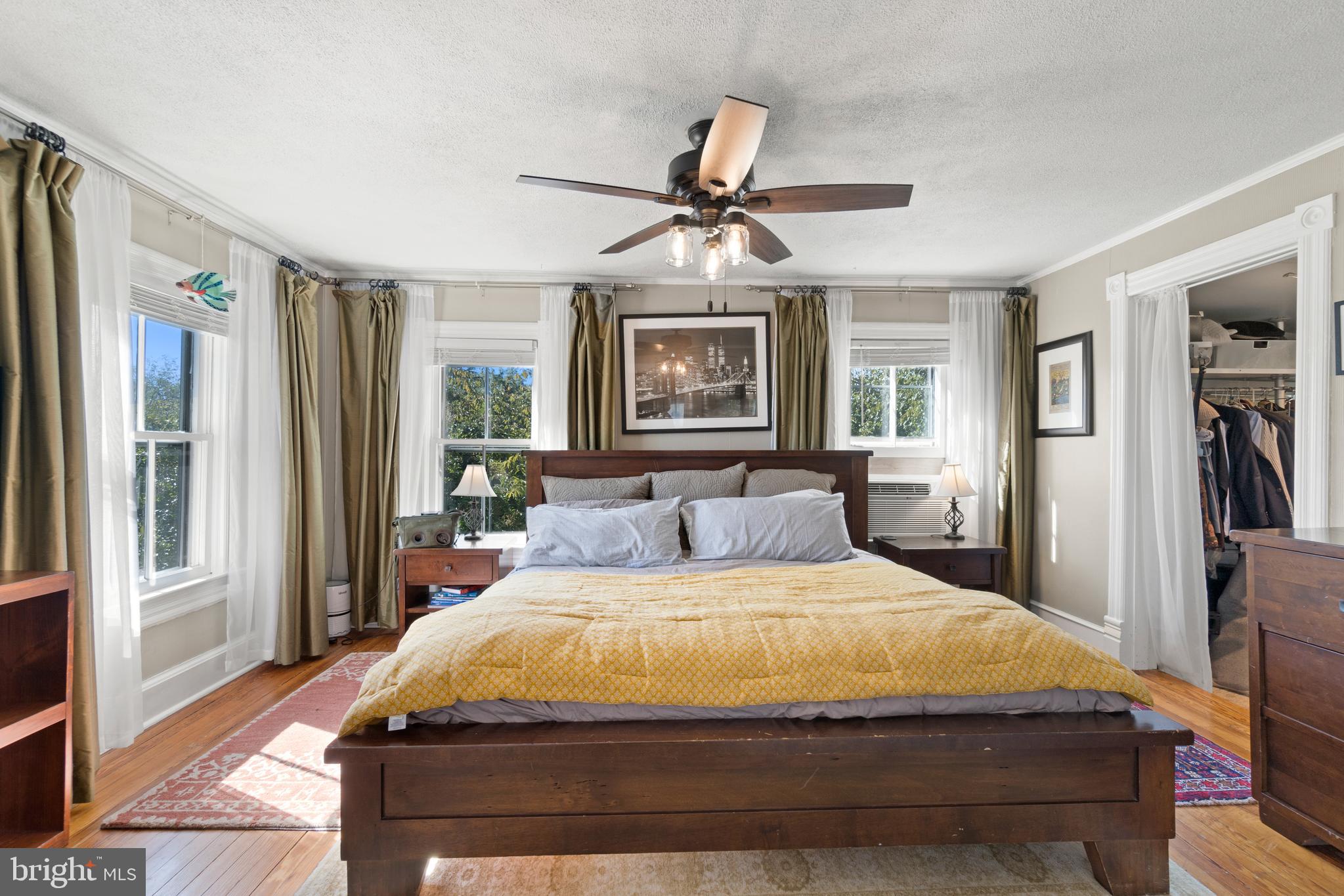 1005 Grant Street Herndon, VA 20170 - Photo 25 of 59 a bedroom with a large bed and a window