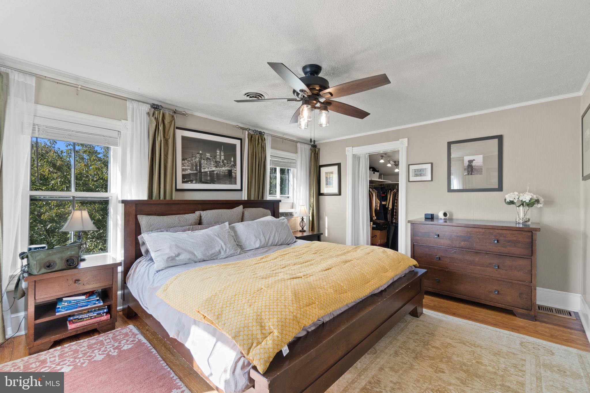 1005 Grant Street Herndon, VA 20170 - Photo 26 of 59 a bedroom with a large bed and a window