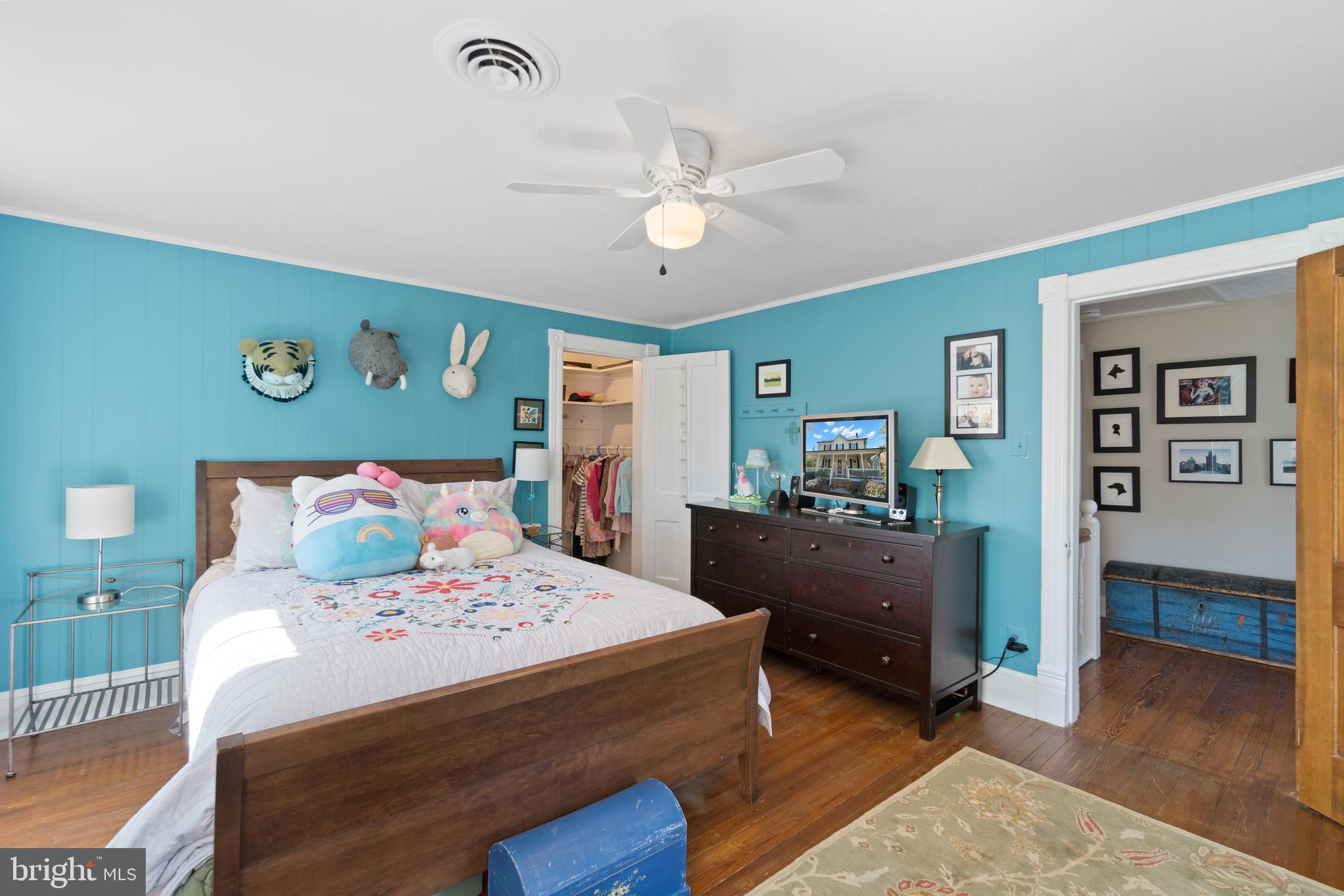 1005 Grant Street Herndon, VA 20170 - Photo 34 of 59 a bedroom with a bed and wooden floor