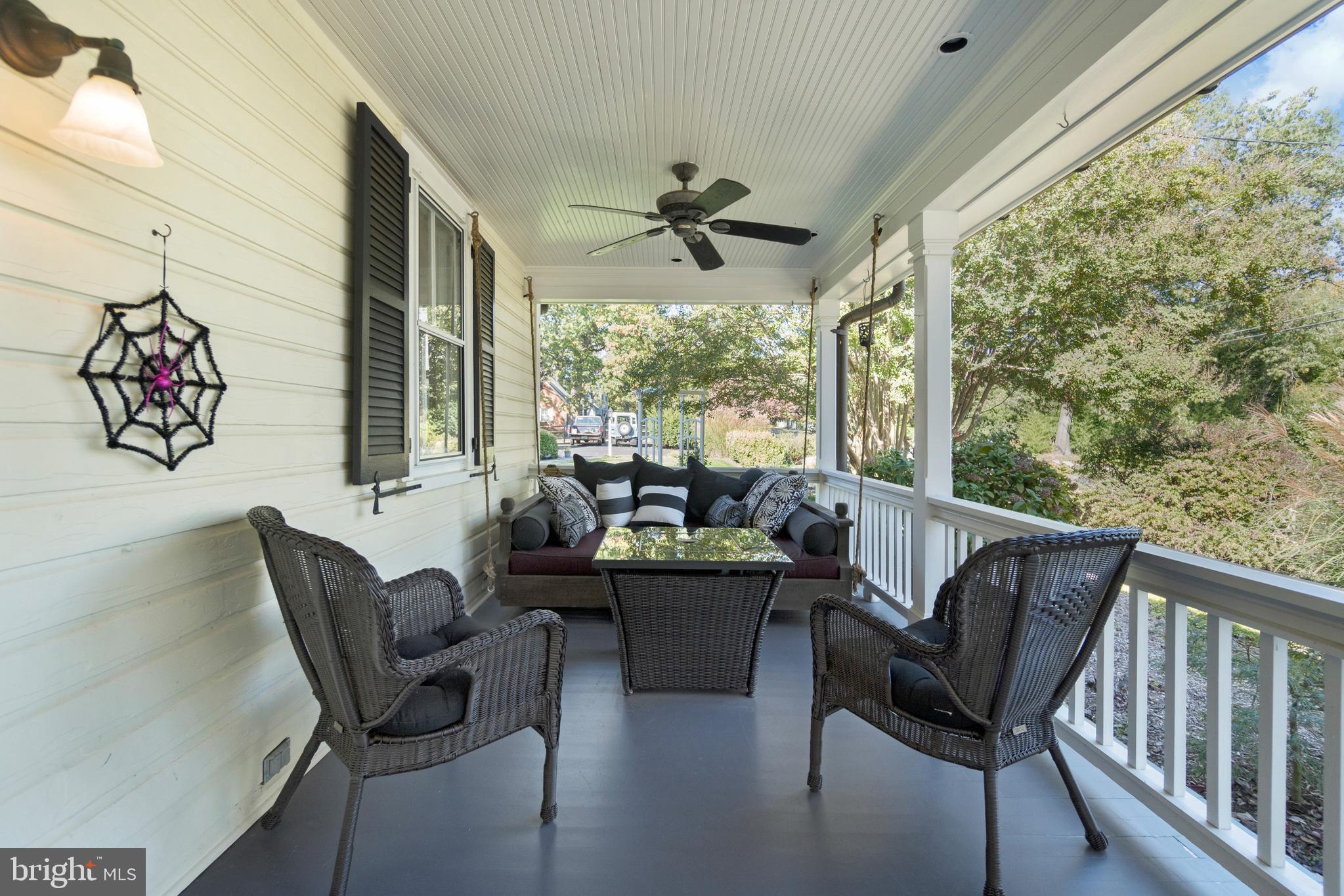 1005 Grant Street Herndon, VA 20170 - Photo 4 of 59 a living room with furniture and a large window