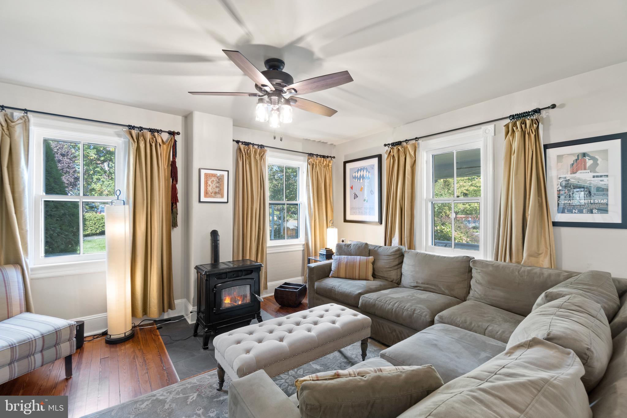 1005 Grant Street Herndon, VA 20170 - Photo 8 of 59 a living room with furniture and a large window