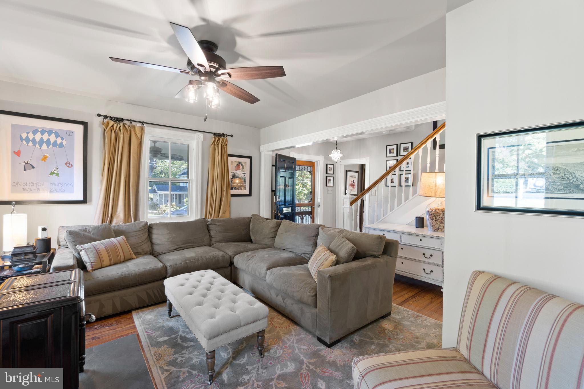 1005 Grant Street Herndon, VA 20170 - Photo 10 of 59 a living room with furniture and a large window