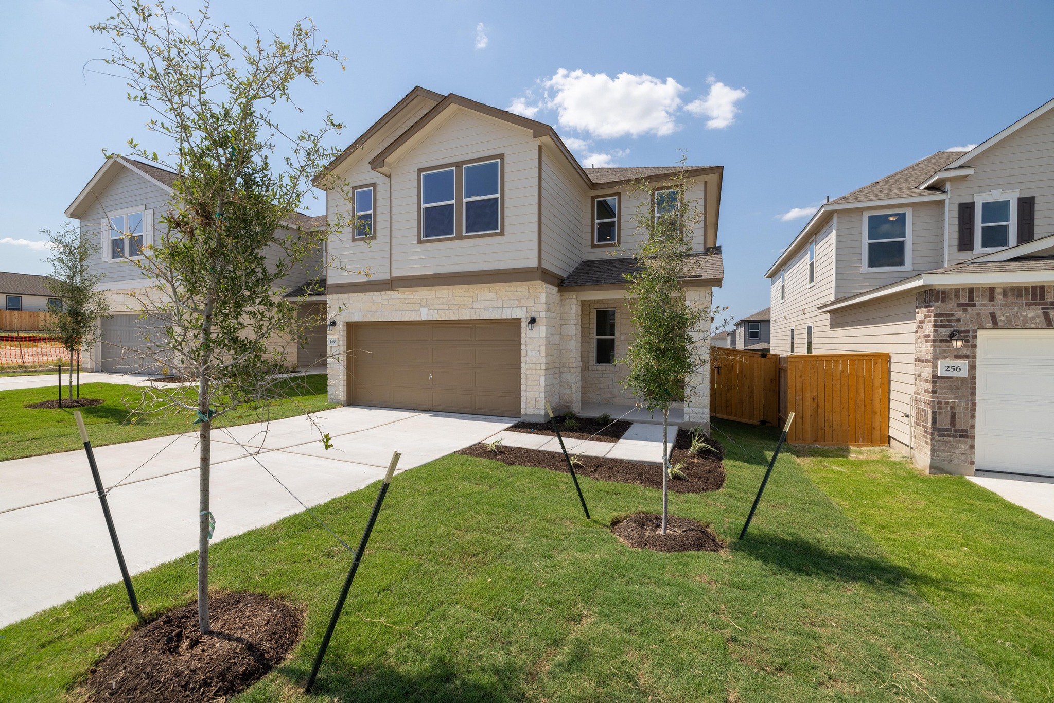 260 Feathers Street Jarrell, TX 76537 - Photo 2 of 34 a view of a house with backyard