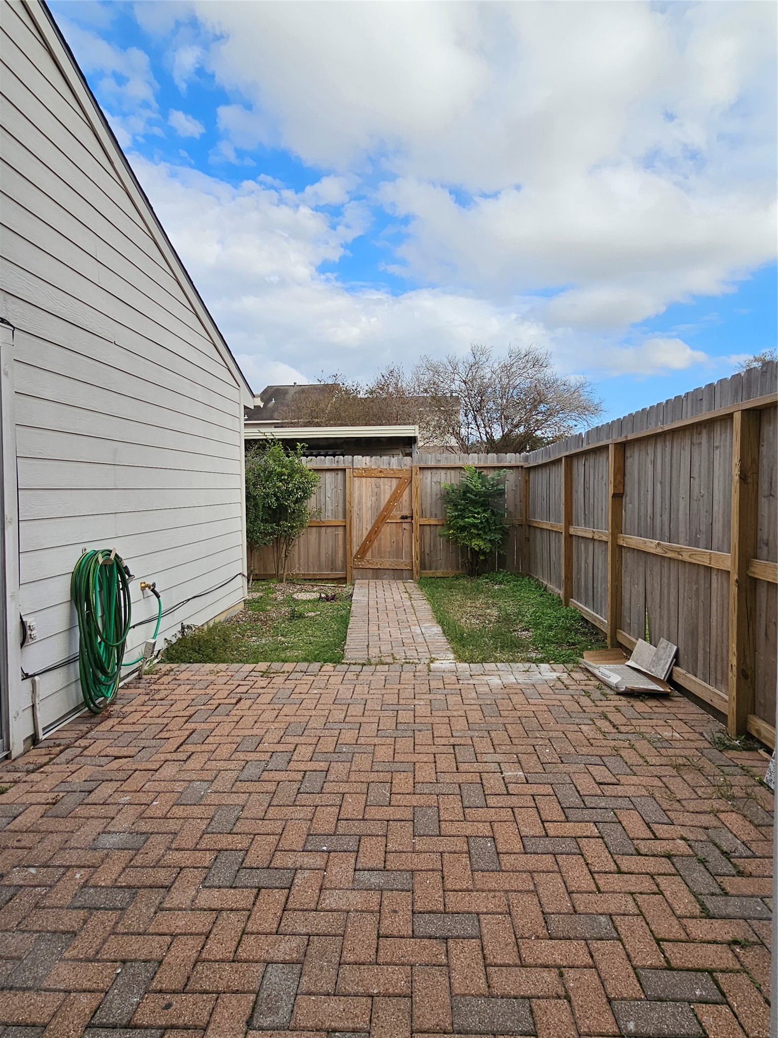 7887 Kendalia Drive Houston, TX 77036 - Photo 11 of 23 a view of a backyard with sitting area