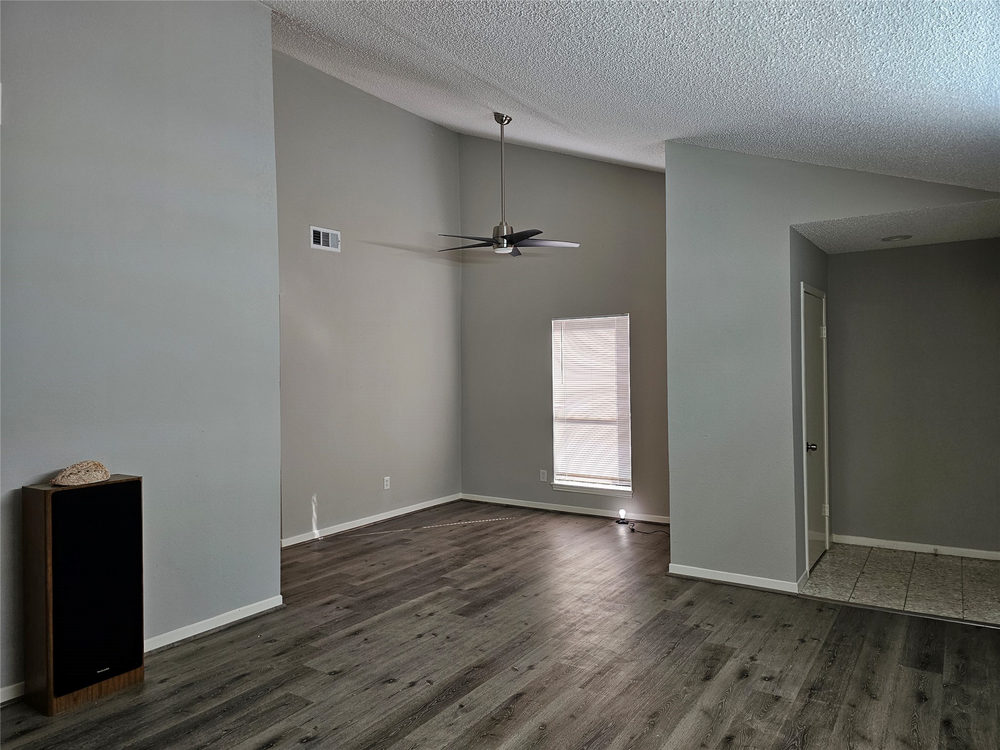 7887 Kendalia Drive Houston, TX 77036 - Photo 2 of 23 wooden floor in an empty room
