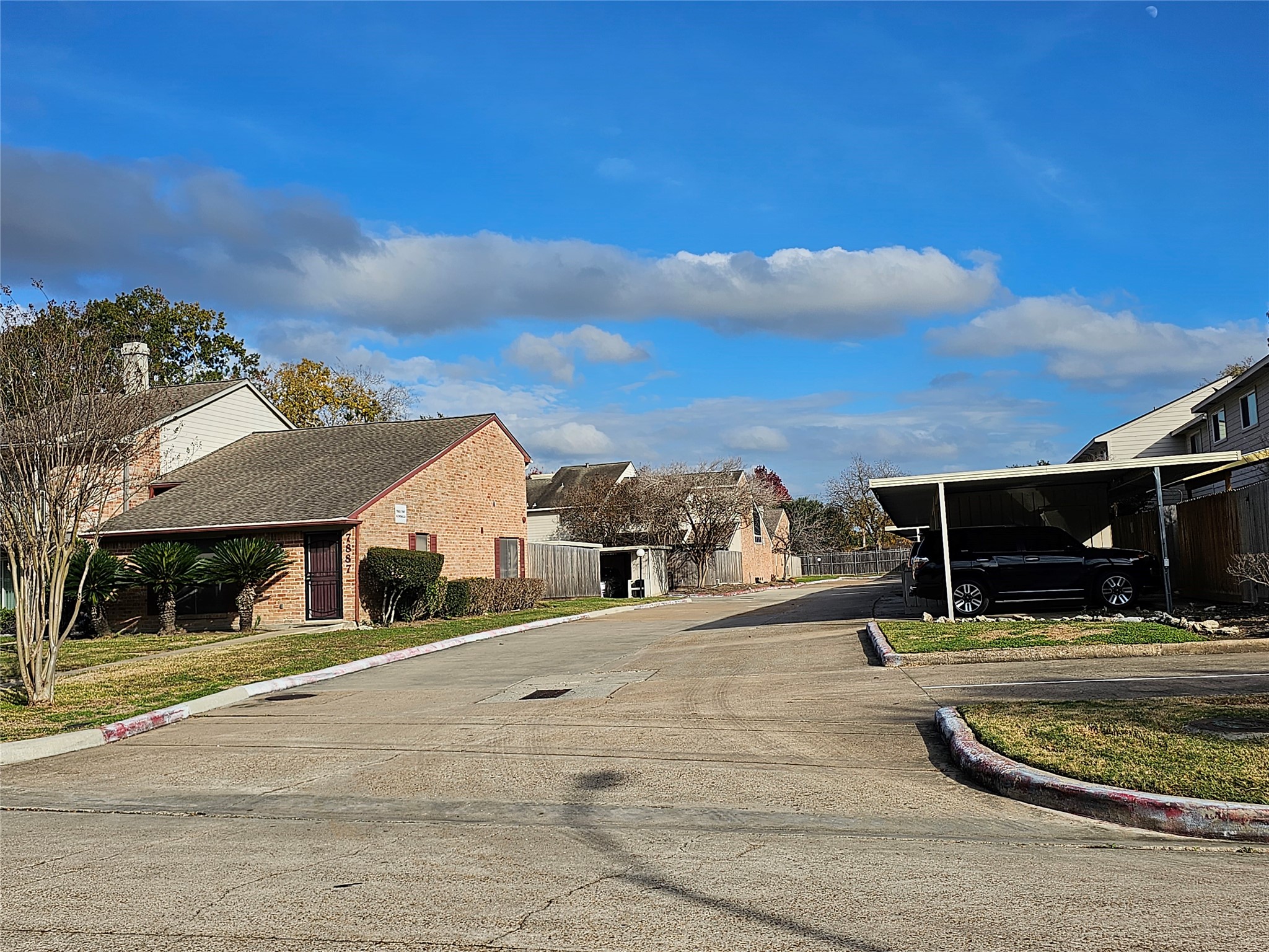 7887 Kendalia Drive Houston, TX 77036 - Photo 23 of 23 a view of a house with a yard