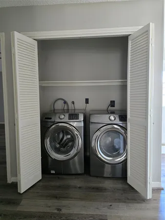 a view of washer and dryer in a utility room