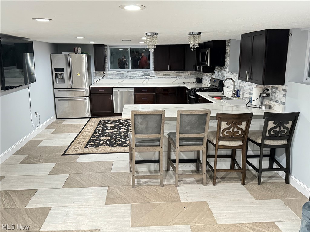 7845 Ridge Road North Royalton, OH 44133 - Photo 17 of 22 Tile Flooring & Bar Area in Basement Kitchen