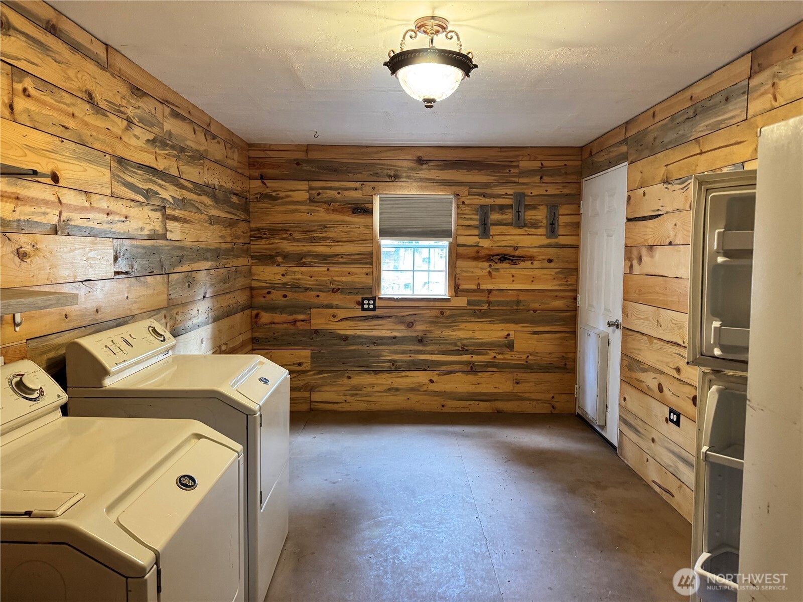 13 Rope And Saddle Lane Tonasket, WA 98855 - Photo 11 of 28 a view of a storage & utility room