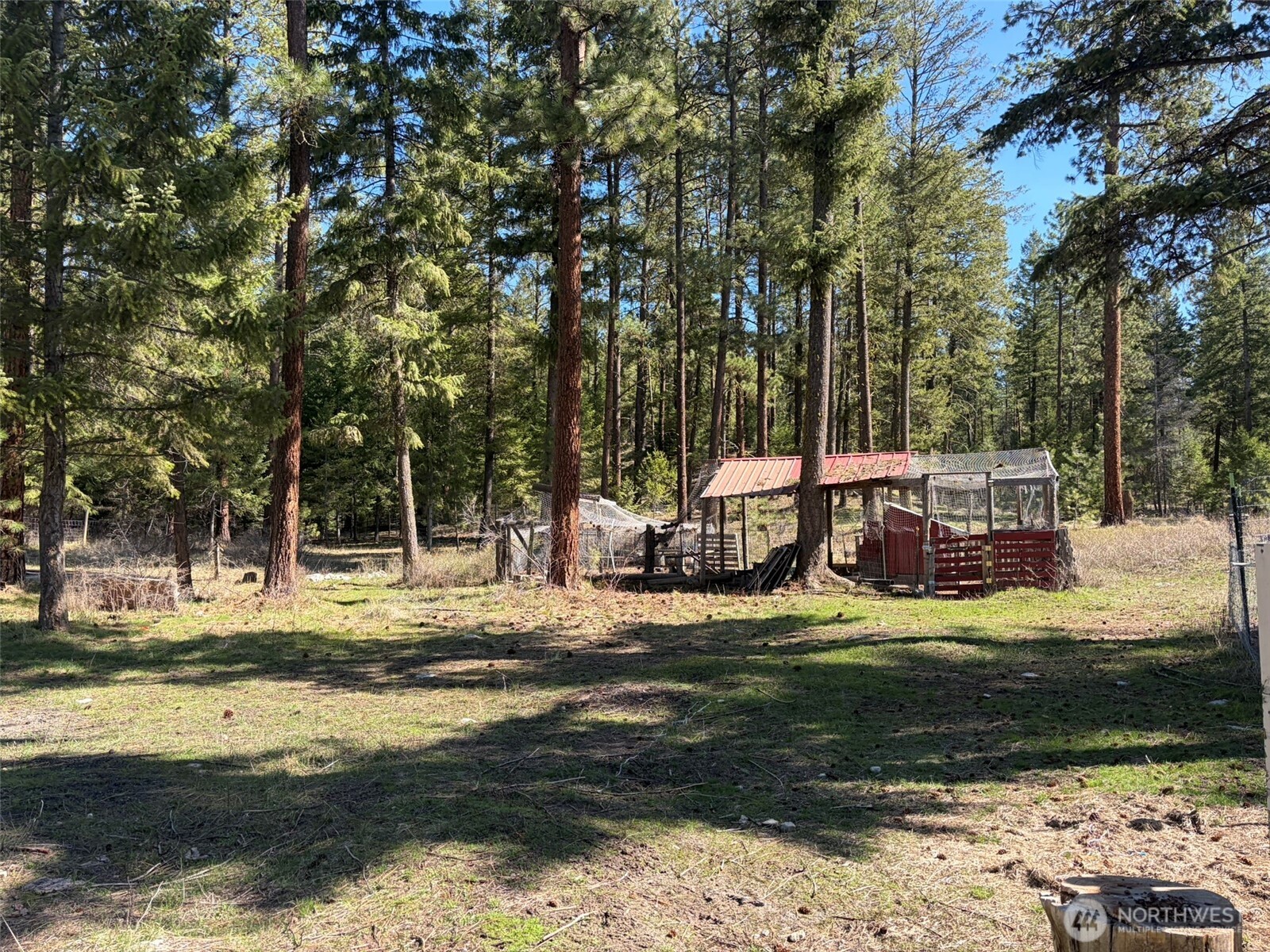 13 Rope And Saddle Lane Tonasket, WA 98855 - Photo 22 of 28 a view of a lake with houses