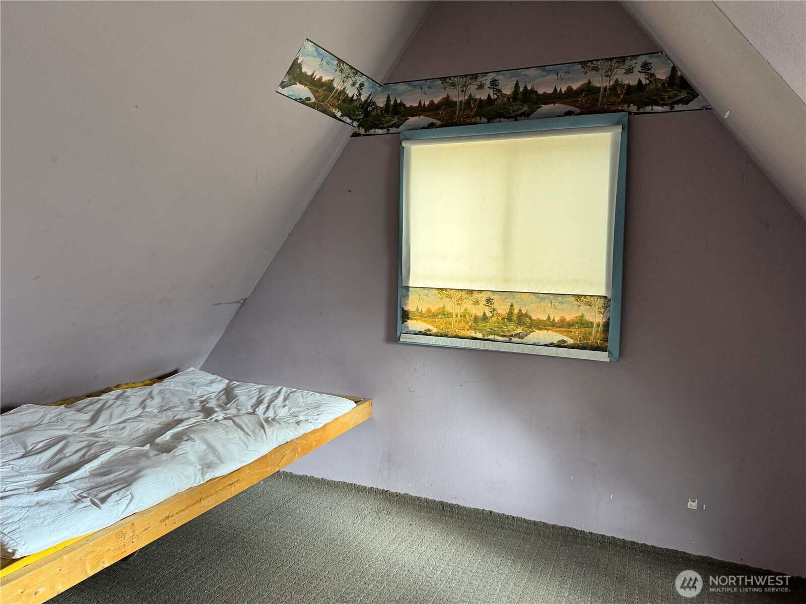 13 Rope And Saddle Lane Tonasket, WA 98855 - Photo 8 of 28 a bedroom with a bed and a window