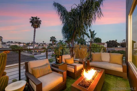 a view of outdoor space yard deck patio and fire pit