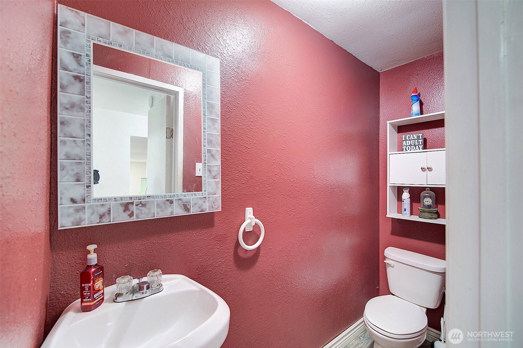 35814 11th Avenue Southwest Federal Way, WA 98023 - Photo 16 of 24 a bathroom with a toilet sink and mirror