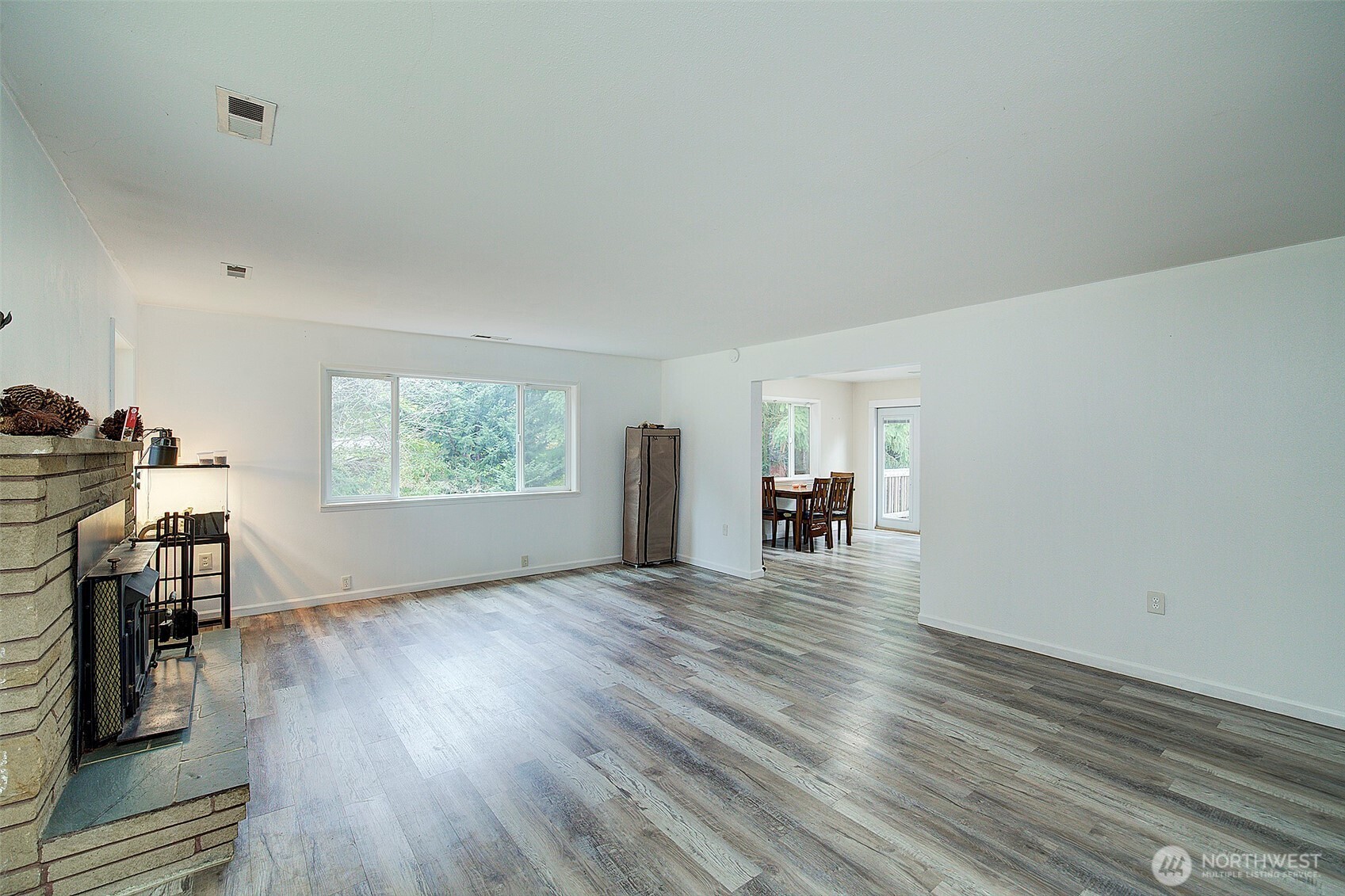 35814 11th Avenue Southwest Federal Way, WA 98023 - Photo 5 of 24 a view of empty room with wooden floor and fan