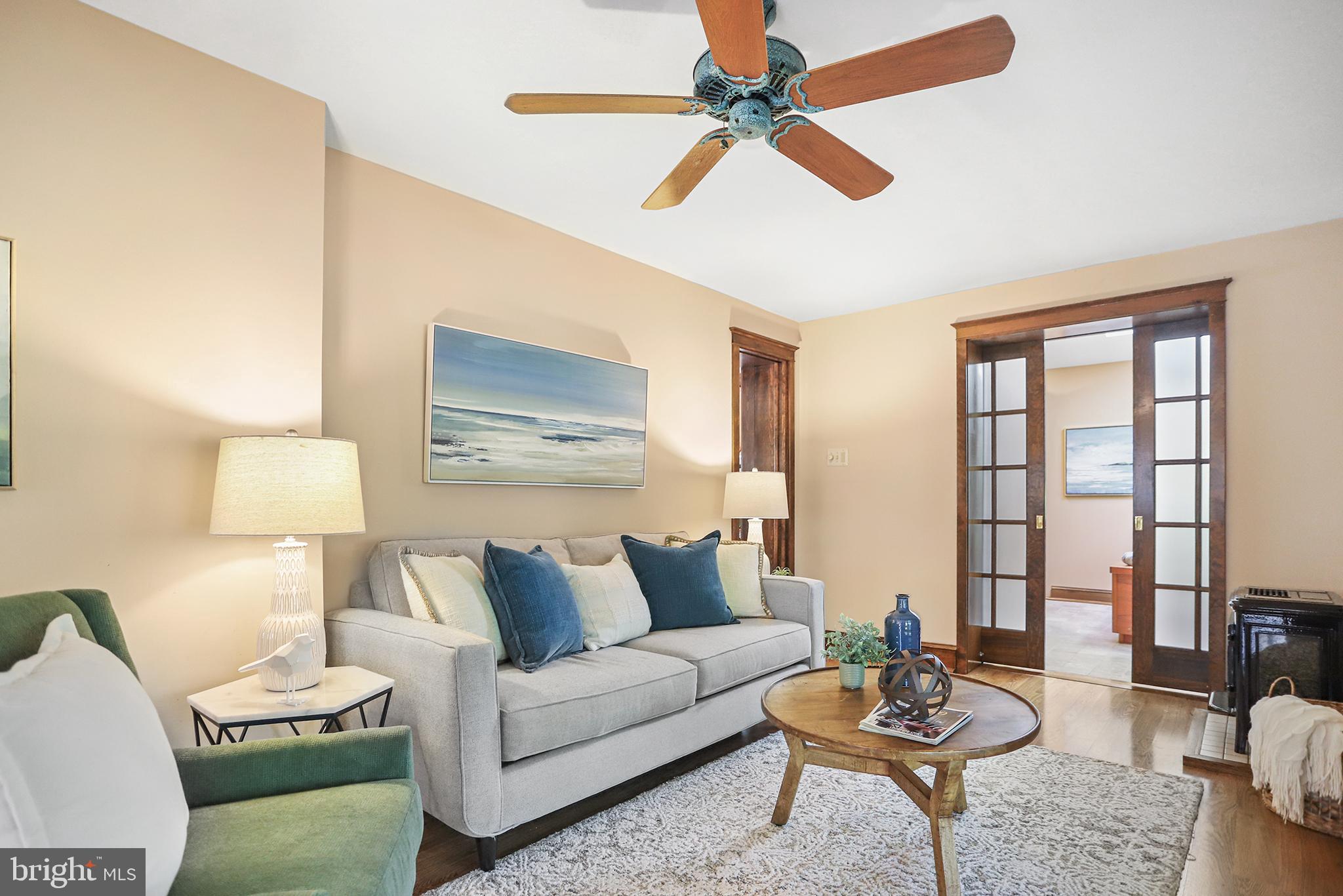 38 Green Valley Road Wallingford, PA 19086 - Photo 18 of 33 a living room with furniture and a large window