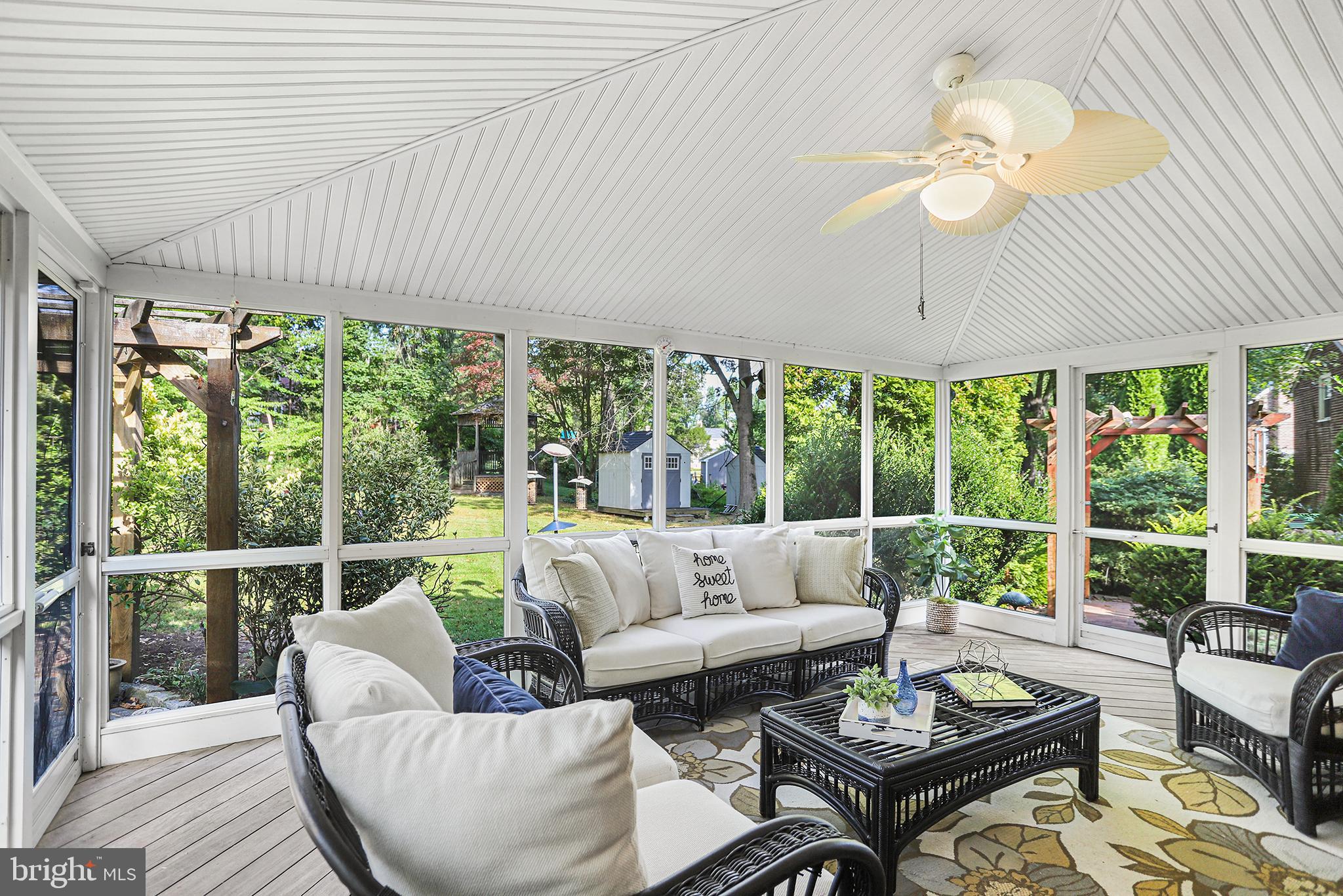 38 Green Valley Road Wallingford, PA 19086 - Photo 21 of 33 a living room with furniture and a large window