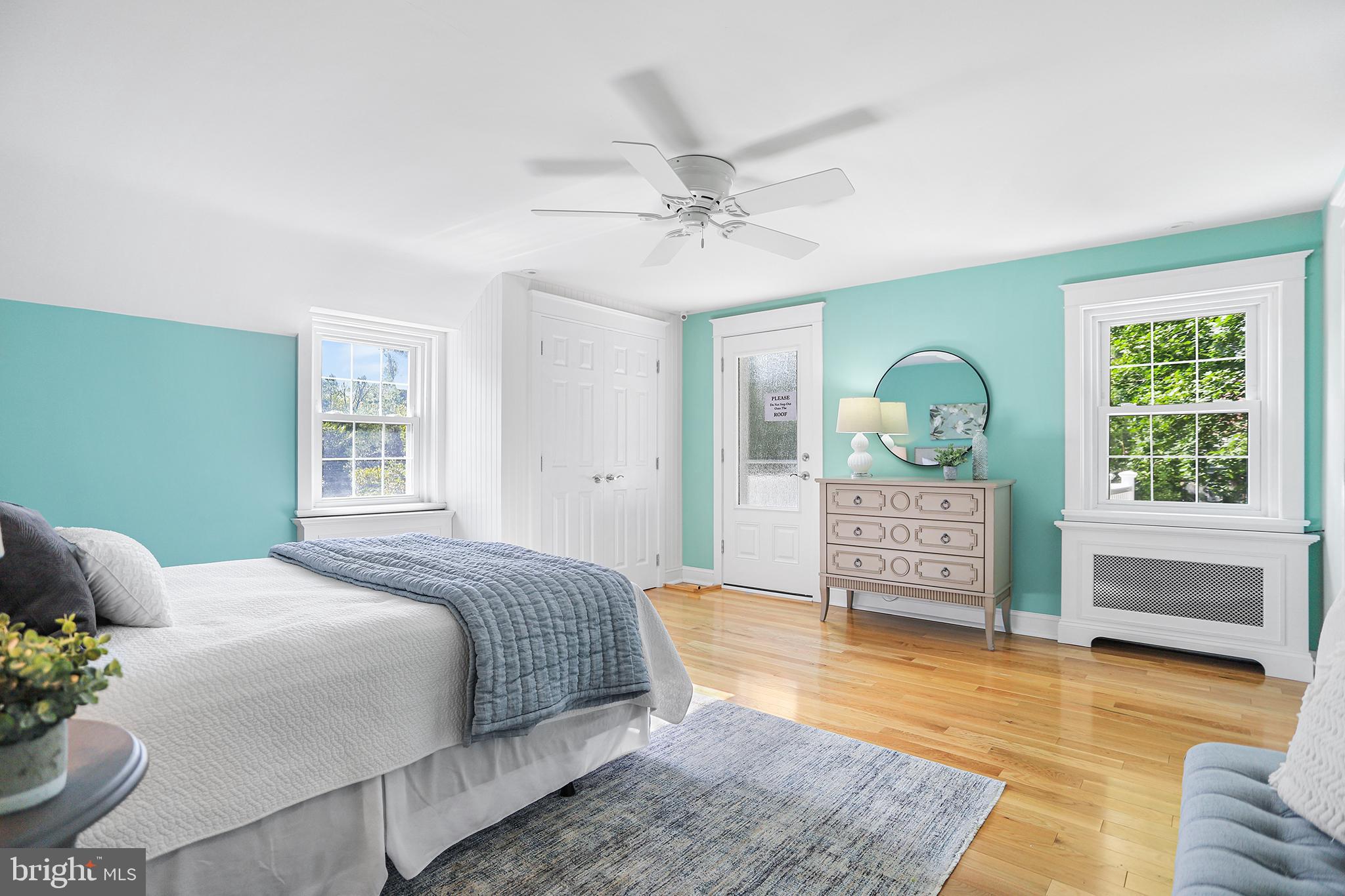 38 Green Valley Road Wallingford, PA 19086 - Photo 24 of 33 a spacious bedroom with a bed a dresser and a window