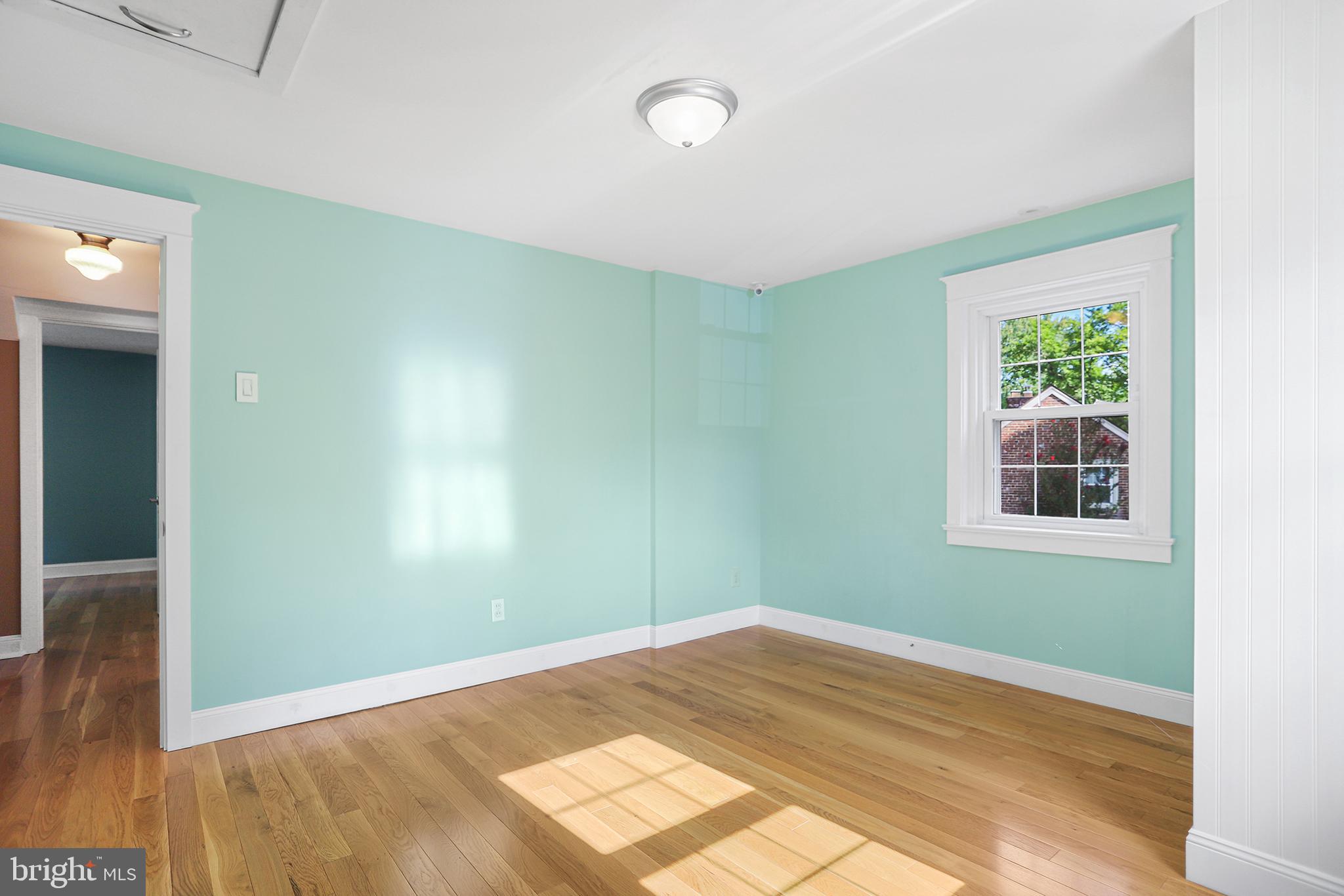 38 Green Valley Road Wallingford, PA 19086 - Photo 27 of 33 a view of a room with wooden floor and entryway