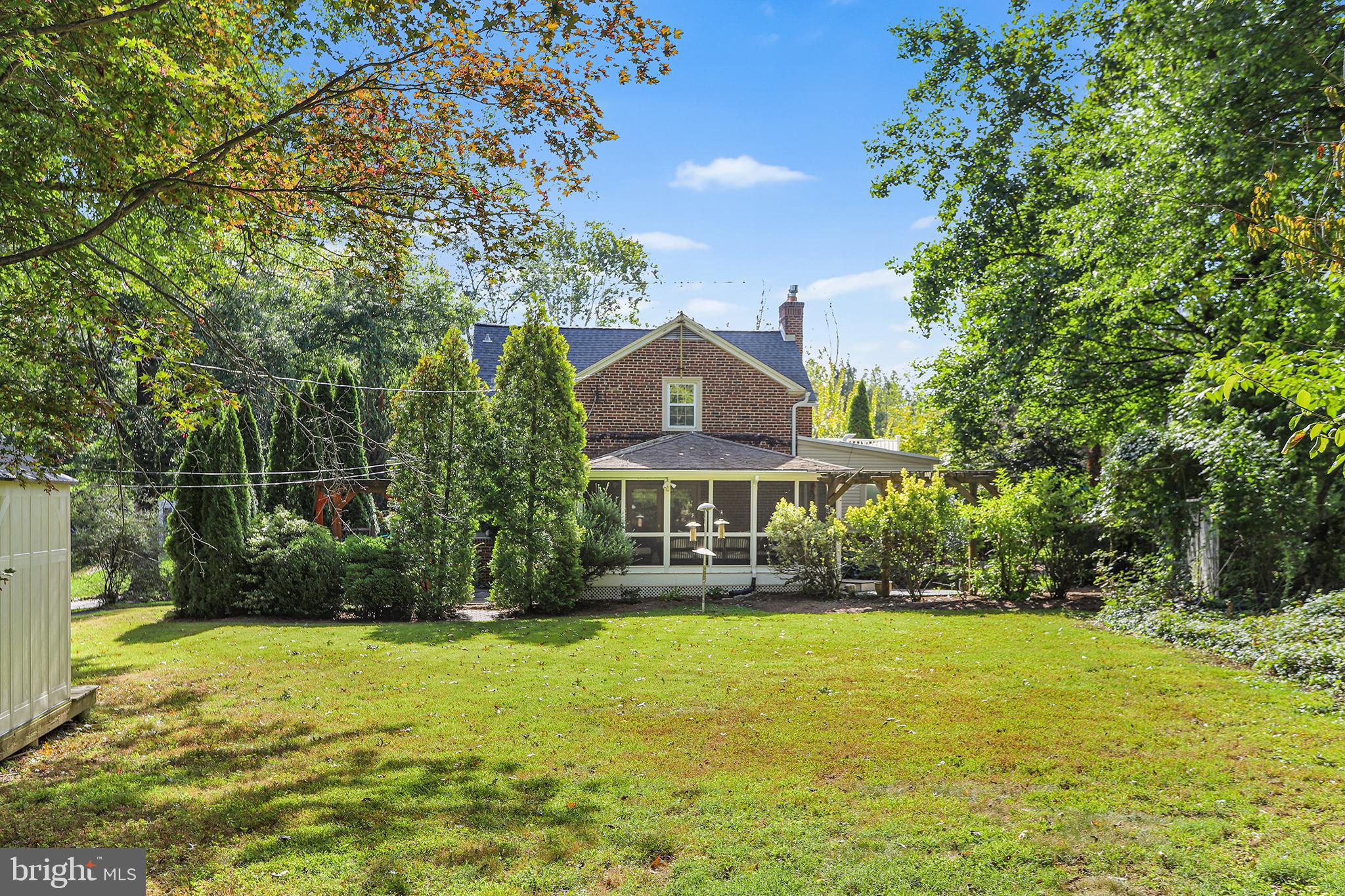 38 Green Valley Road Wallingford, PA 19086 - Photo 33 of 33 a front view of a house with a yard