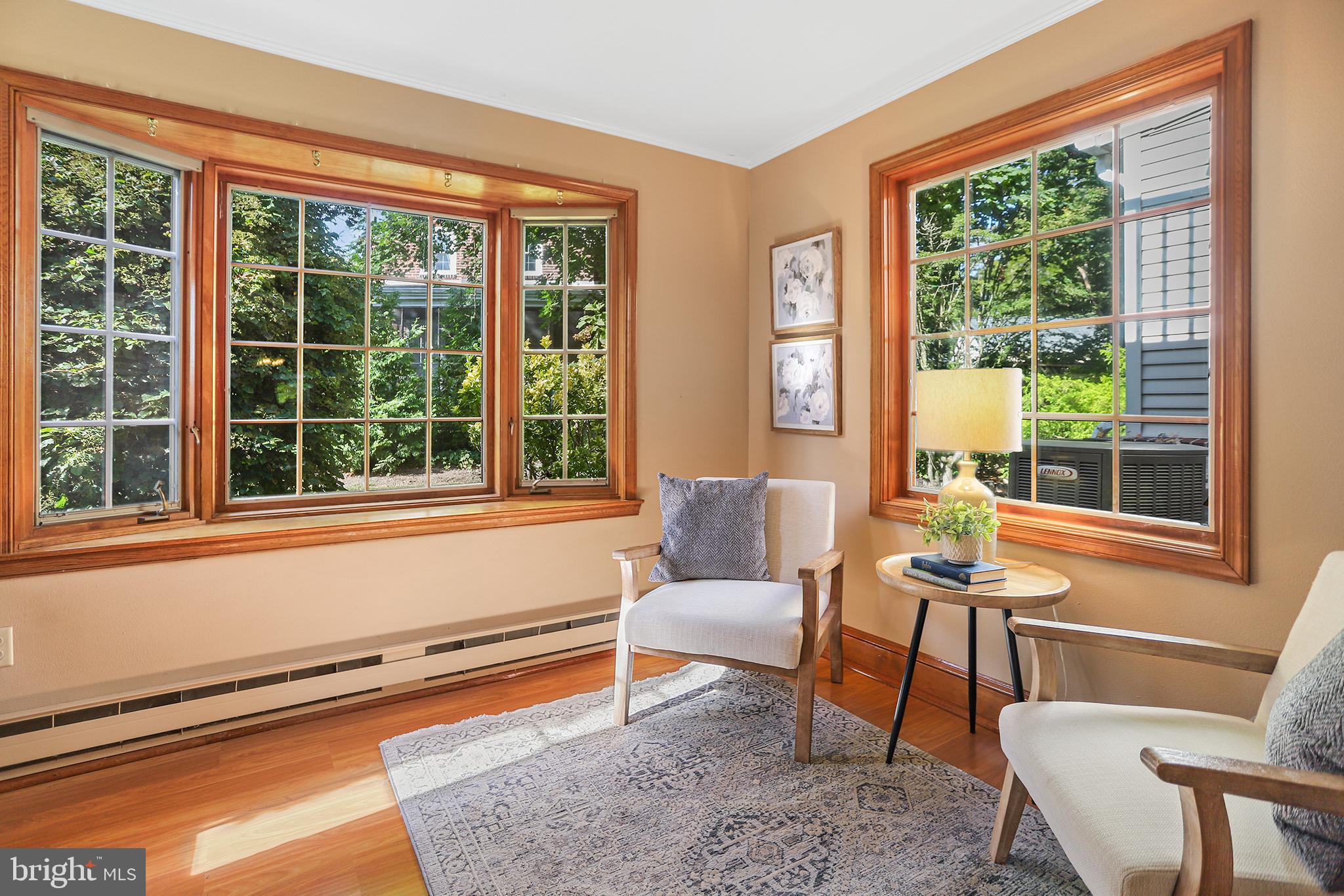 38 Green Valley Road Wallingford, PA 19086 - Photo 4 of 33 a living room with furniture and a window