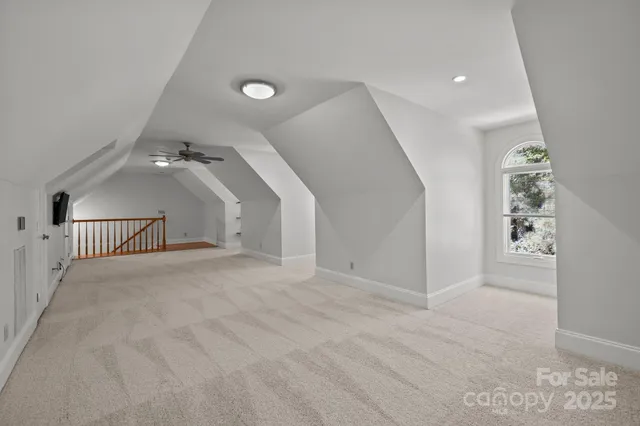 a view of a hallway with windows