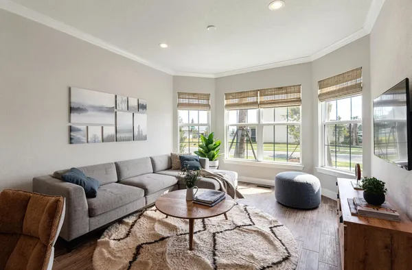 a bedroom with a bed and a couch