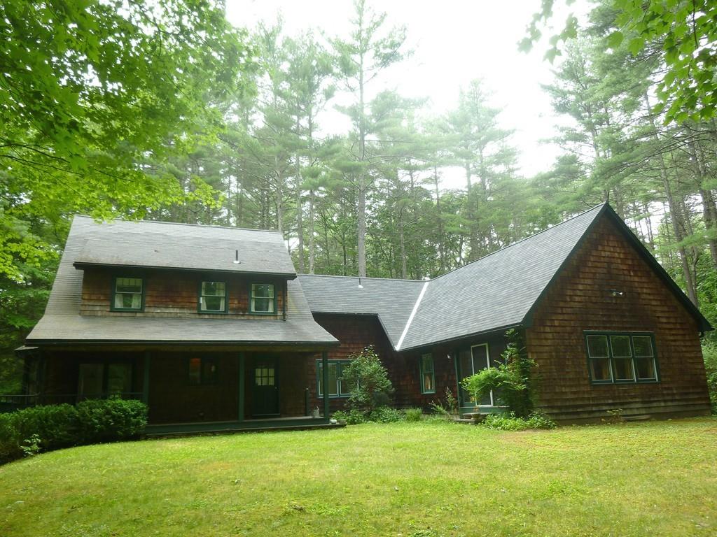 115 Audubon Road Northampton, MA 01053 - Photo 3 of 30 a front view of a house with a yard