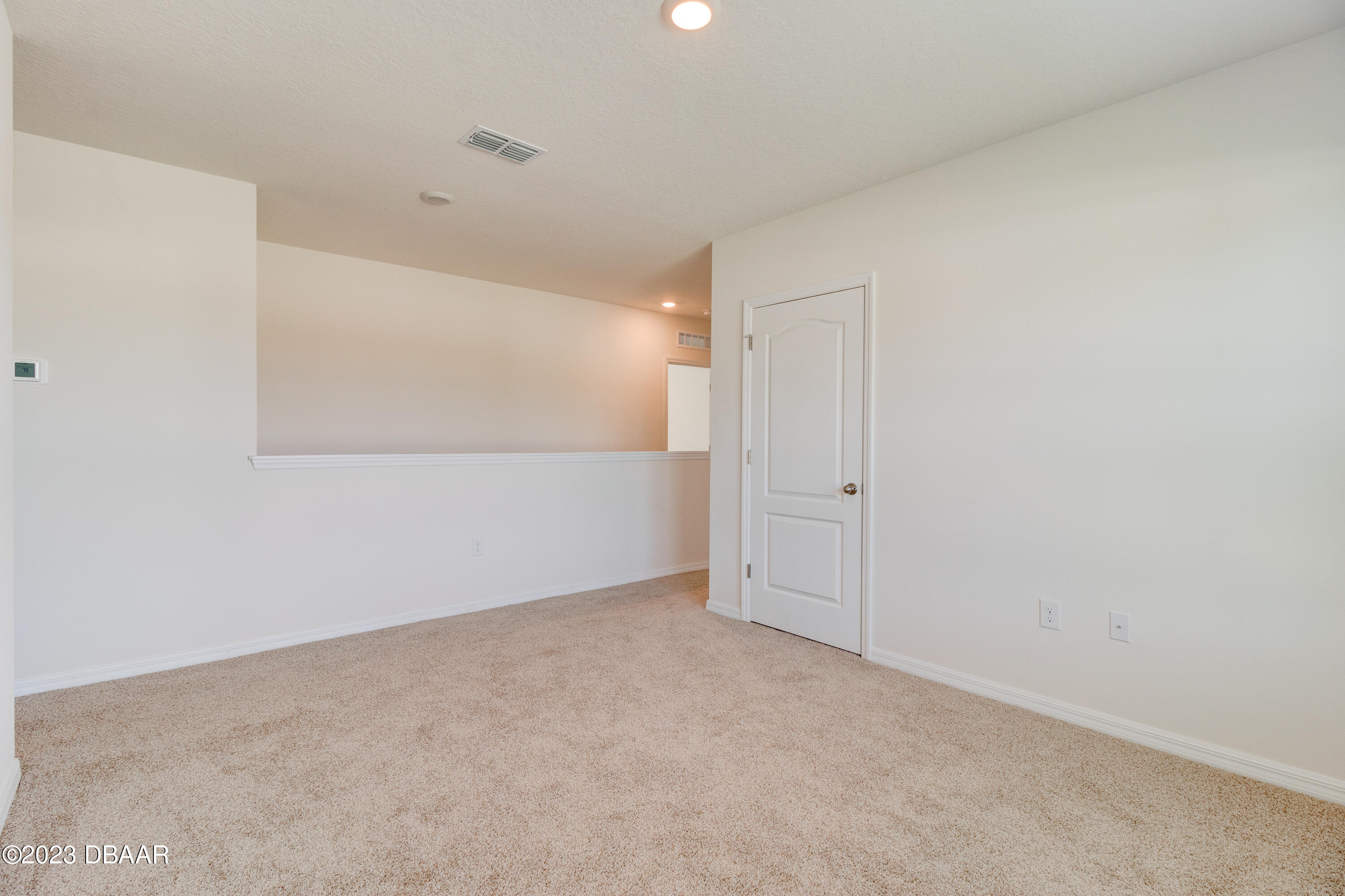 60 Trailmark Court Ormond Beach, FL 32174 - Photo 15 of 21 Loft, living area, playroom or 6th bedro